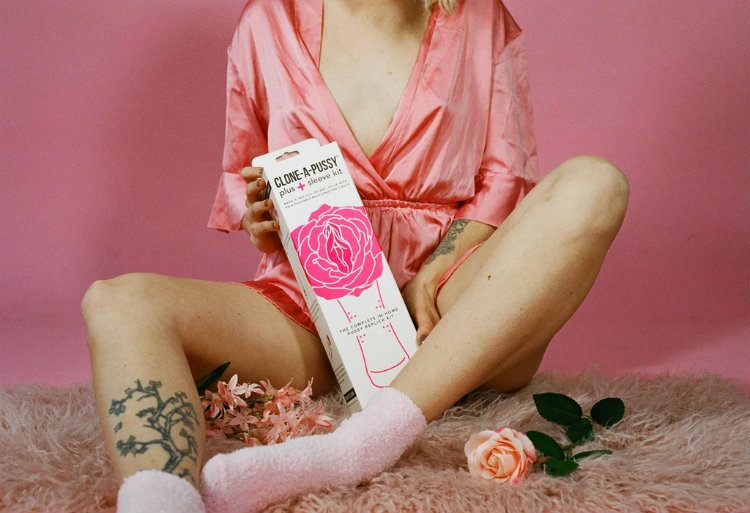 Women in pink introducing clone a pussy sex toys