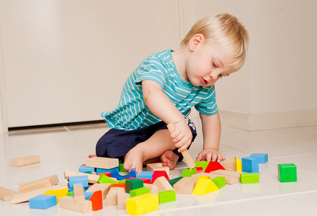 baby-playing-with-toys-early-development