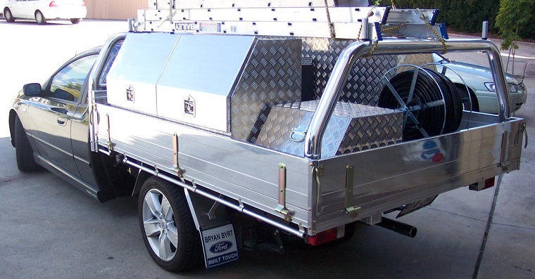picture of ute tray with aluminum toolboxes  