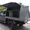 picture of a gray ute canopy with toolbox