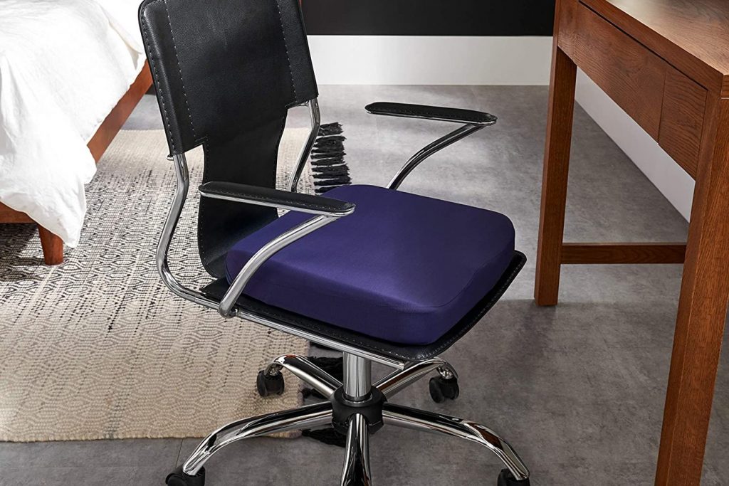 As mentioned before, an ergonomic office chair is a good investment, but it may cost you a fortune. On the other hand, you can still turn your chair into a more body-supportive piece of furniture with a simple ergonomic seat cushion. Ergonomic seat cushions are made from memory foam that redistributes your weight evenly to prevent putting pressure on your hips and tailbone. Releasing these spots from the comprehensive force of typical office seats can also improve circulation and digestion. This may help you achieve better blood flow in your pelvis, legs and back and more room in your belly to “do its thing”.