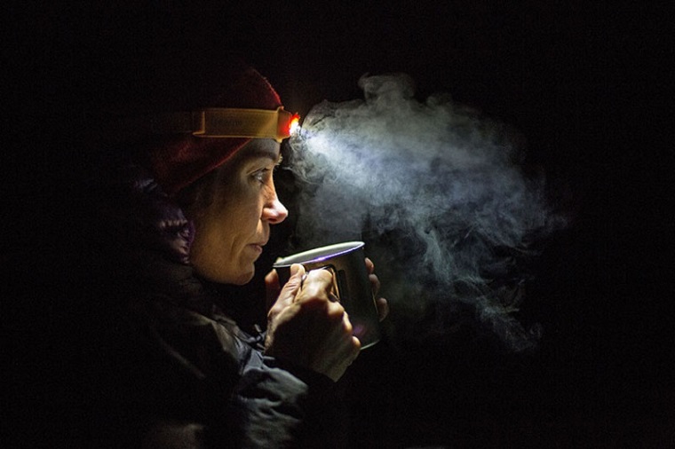 woman using a headlamp