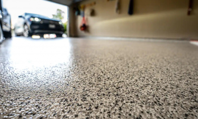 zoomed in floor in garage with epoxy coating background blurred out