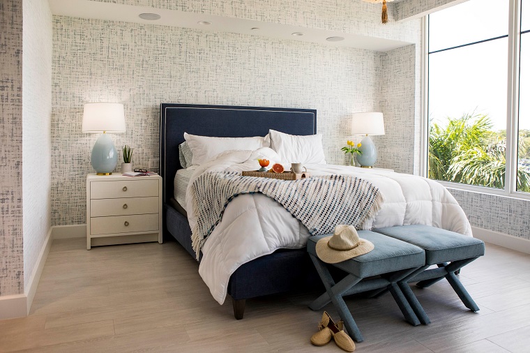 Hamptons-style bedroom with furniture in blue colours