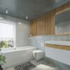 bathroom with a back to wall bathtub