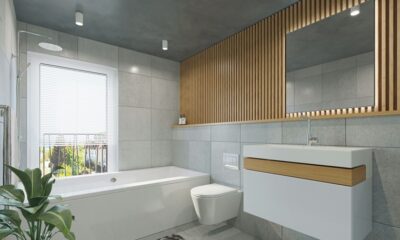 bathroom with a back to wall bathtub